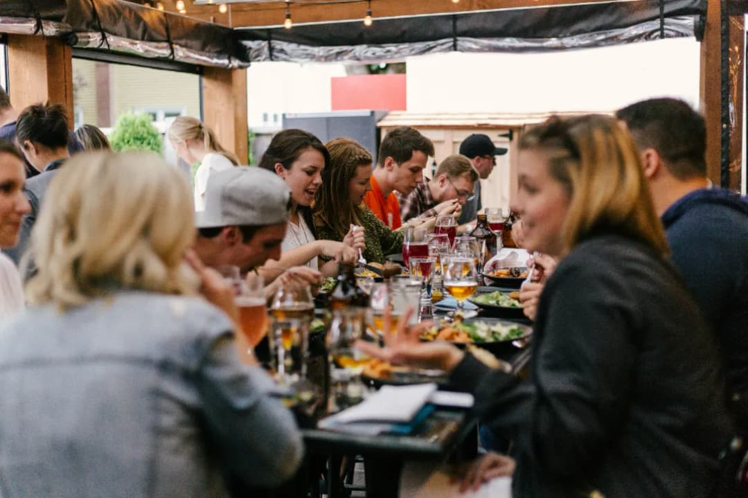family celebrating a meal at a restaurant